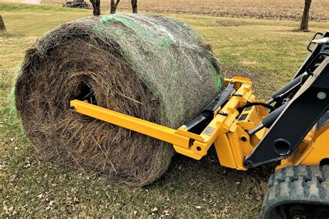 skid steer round bale unroller|round bale unroller manual.